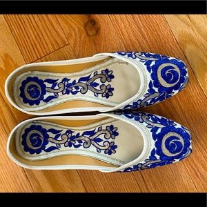 Blue and white jutti flats